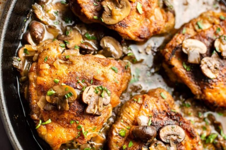 A dish of White Wine Mushroom Chicken Thighs.