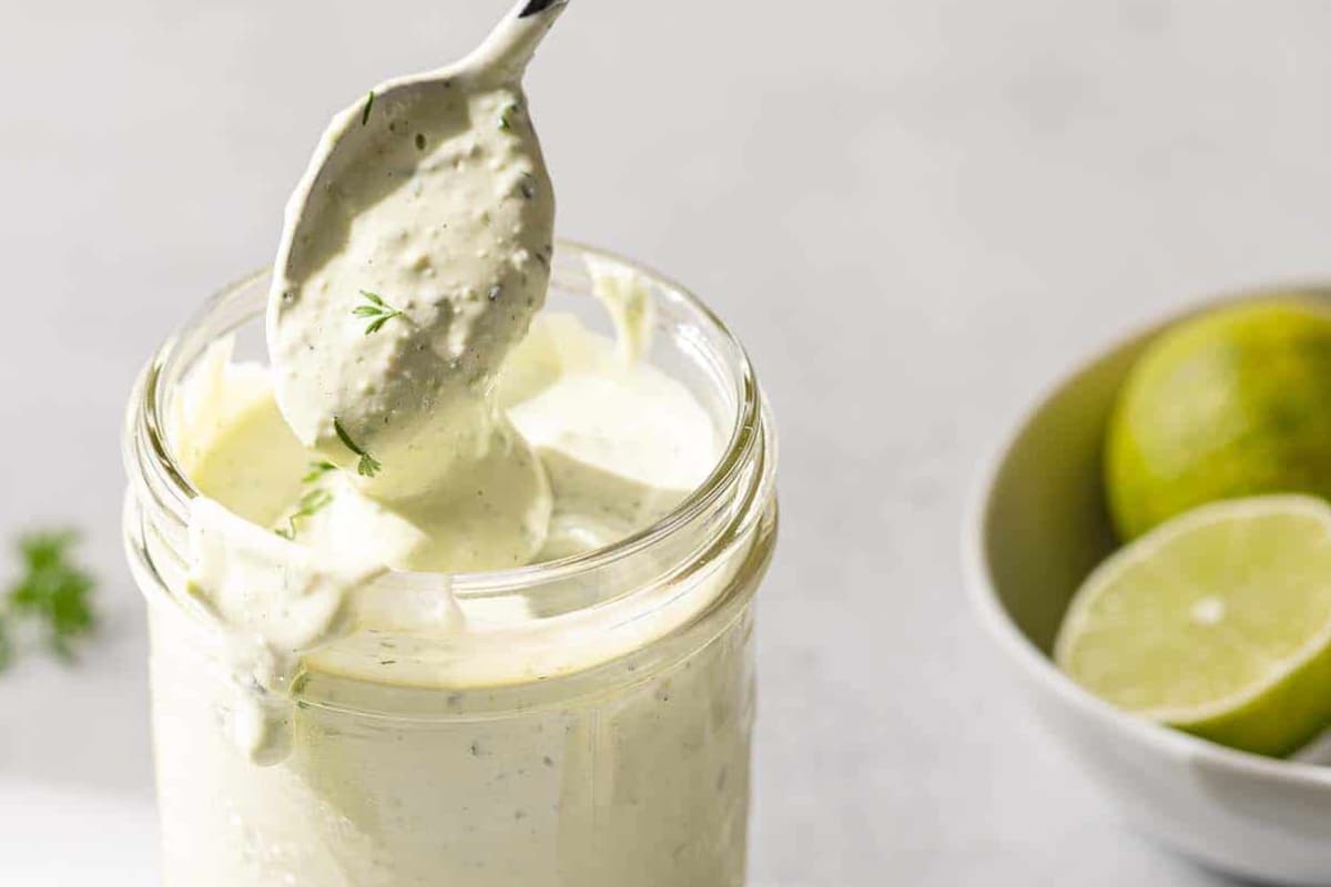 A jar of Avocado Lime Ranch Dressing.
