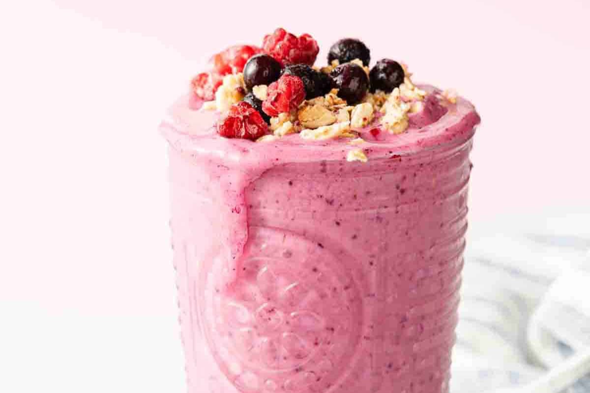 A glass of Raspberry Blueberry Smoothie.