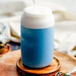 A glass of butterfly pea latte.