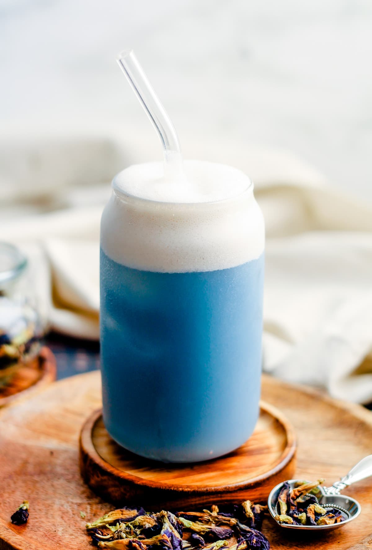 A glass of butterfly pea latte.