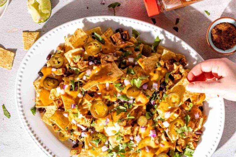 A plate of Spicy Queso Chicken Nachos.
