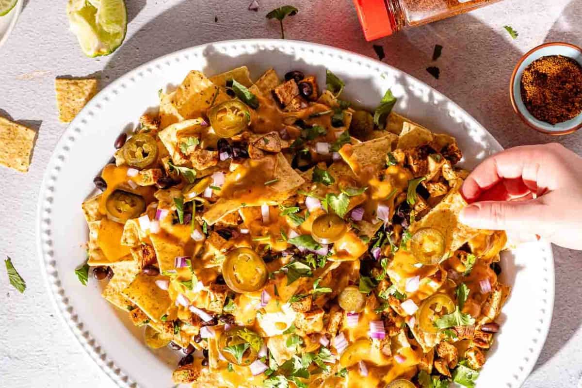 A plate of Spicy Queso Chicken Nachos.