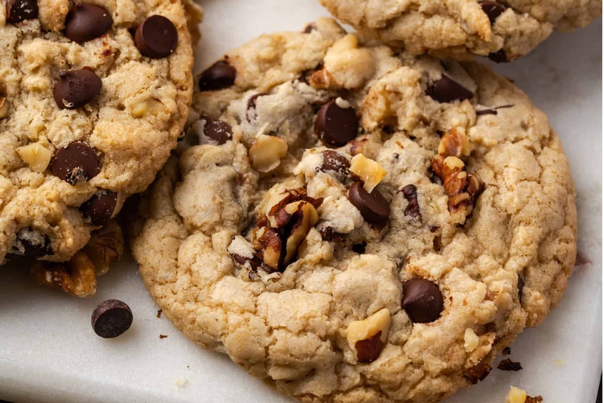 A plate of Chewy Walnut Chocolate Chip Cookies.