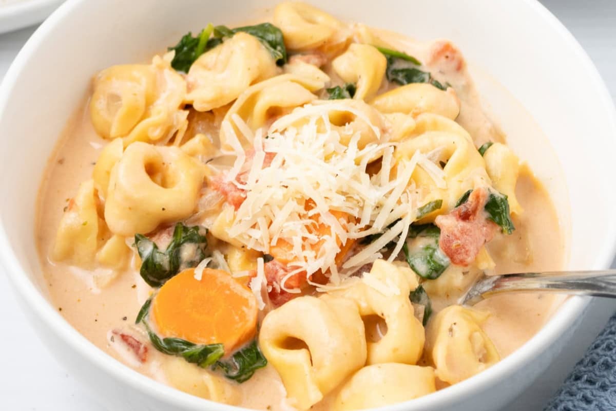 A bowl of Slow Cooker Tortellini Soup.