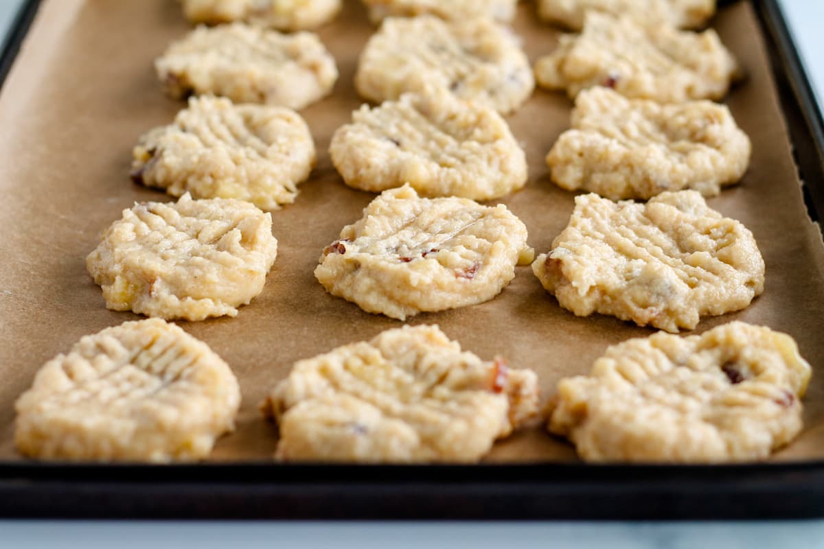 Cookie dough on a baking sheet.