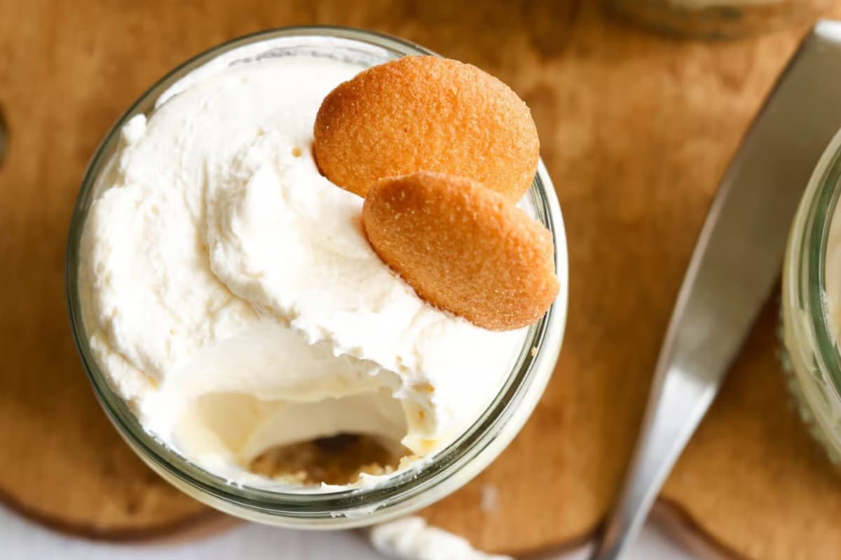 A dish of Mini Banana Cream Pie Jars.