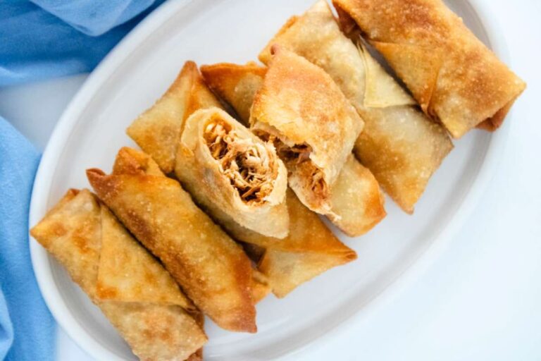 A plate of Slow Cooker Barbecue Chicken Egg Rolls.