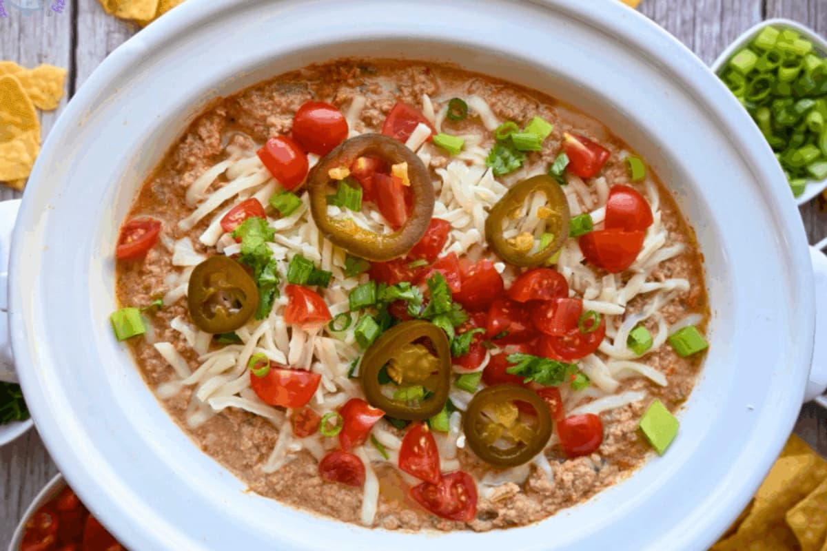 A dish of Slow Cooker Cottage Cheese Taco Dip.