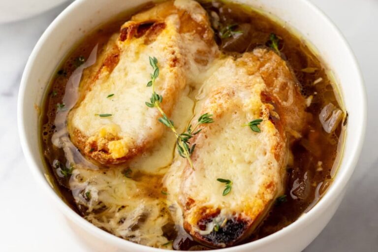 A dish of Slow Cooker French Onion Soup.