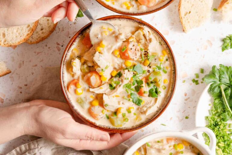 A dish of Slow Cooker Chicken and Corn Soup.