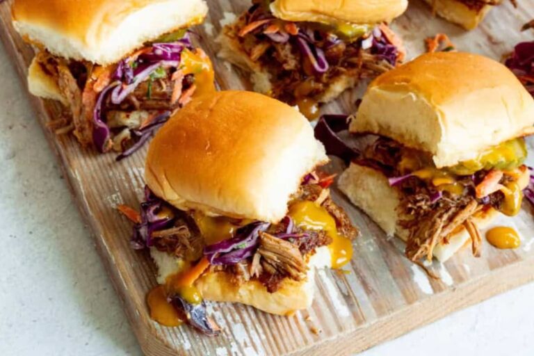 A plate of BBQ Pork Sliders with Cabbage Slaw.