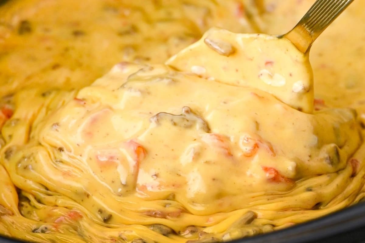 A dish of Rotel Dip with Ground Beef.