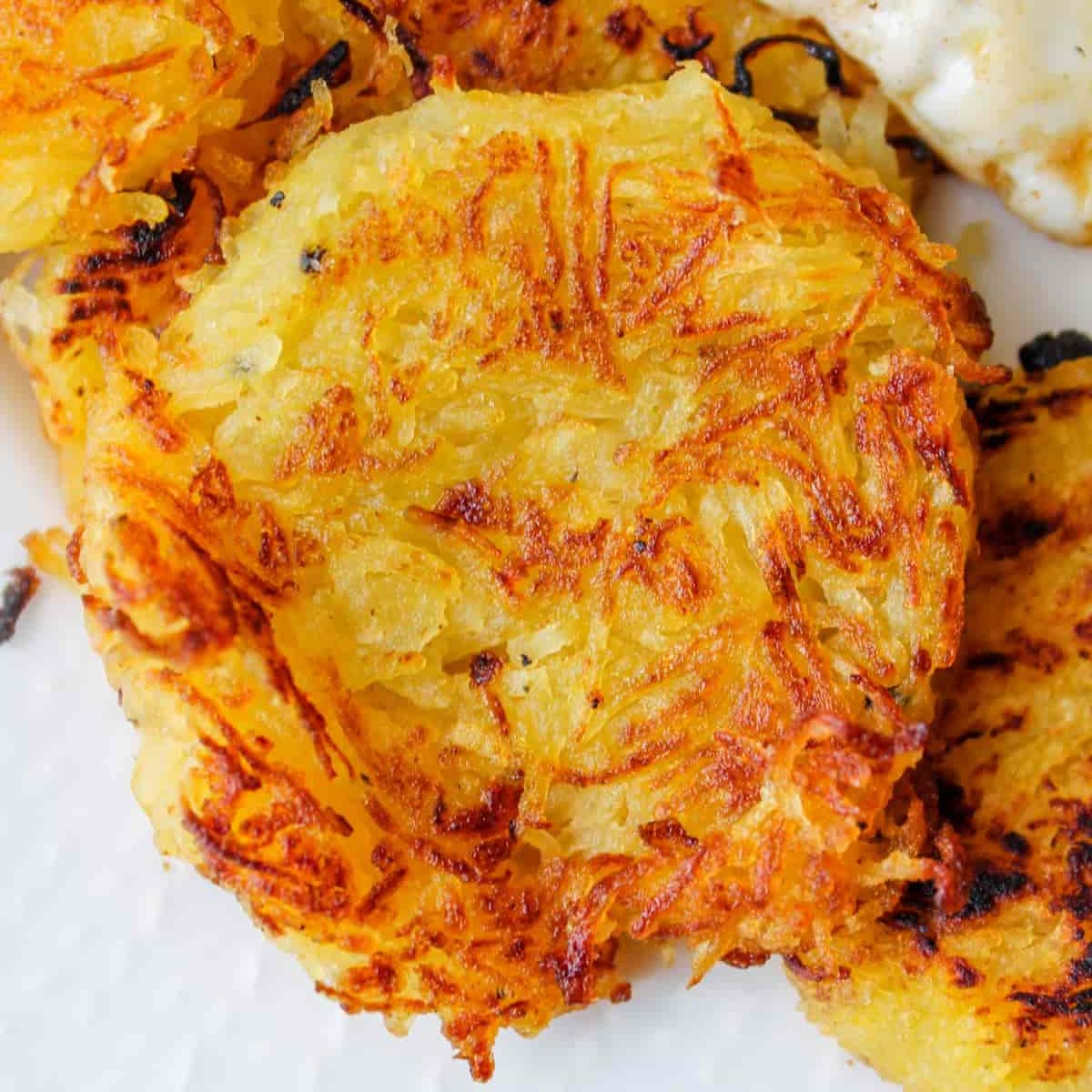 A plate of spaghetti squash hash browns.
