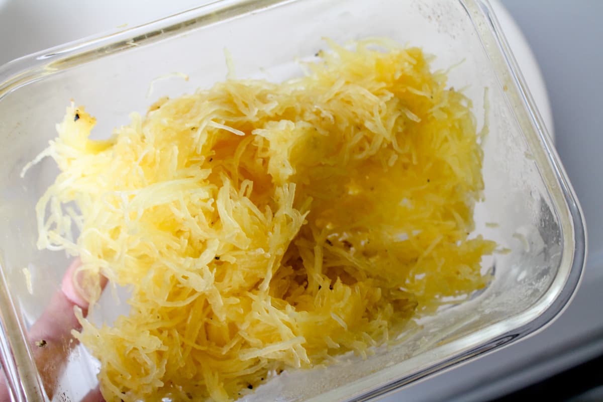 A dish of cooked spaghetti squash.