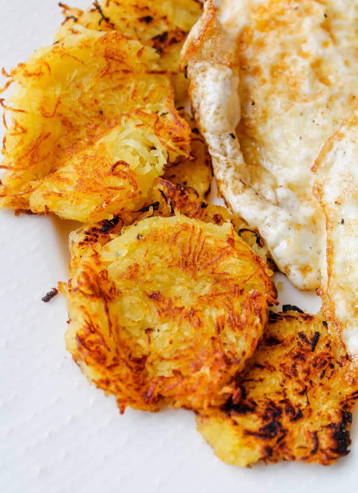A plate of spaghetti squash hash browns.