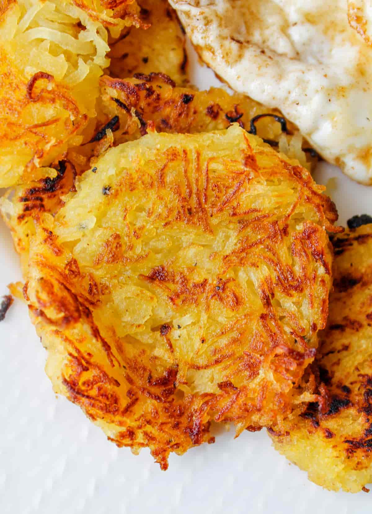 A plate of spaghetti squash hash browns.