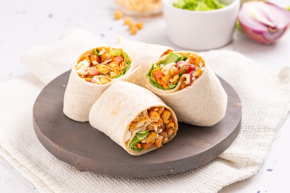 A plate of Buffalo Chickpea Wrap.
