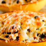 A plate of stuffed spaghetti squash.