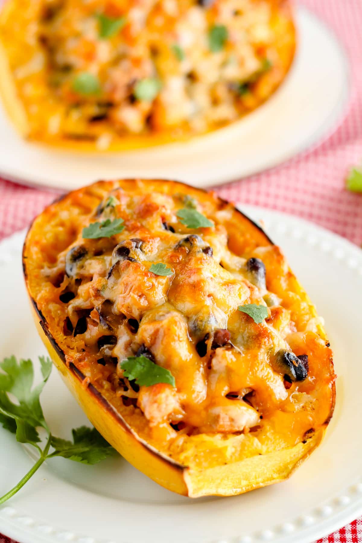A plate of stuffed spaghetti squash.