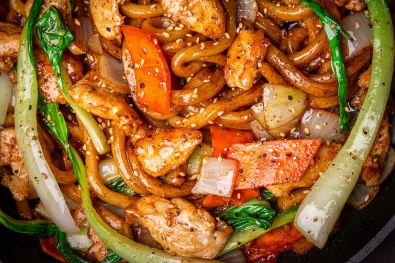 A dish of Chicken Udon Noodle Stir Fry.