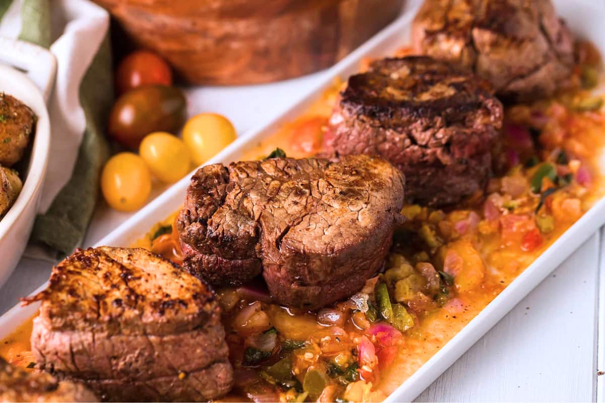 A dish of Pan Roasted Beef Tenderloin Medallions.