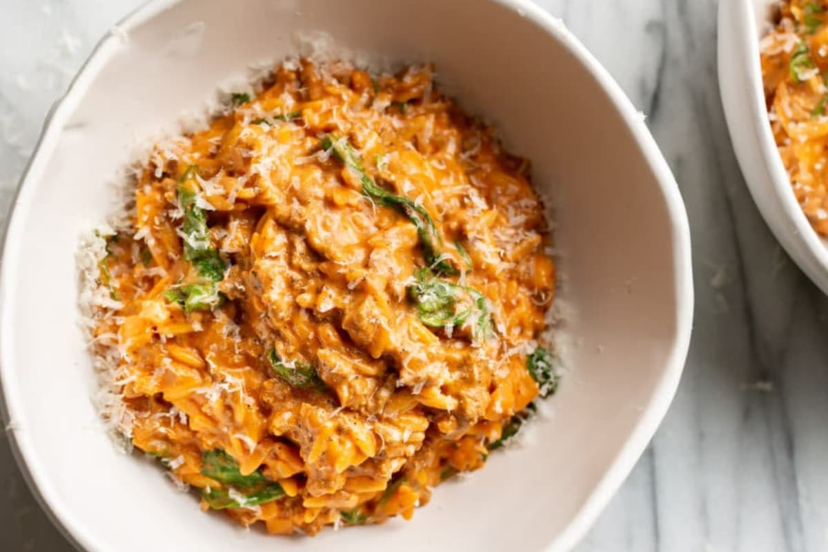 A dish of Ground Beef Orzo with Tomato Cream Sauce.