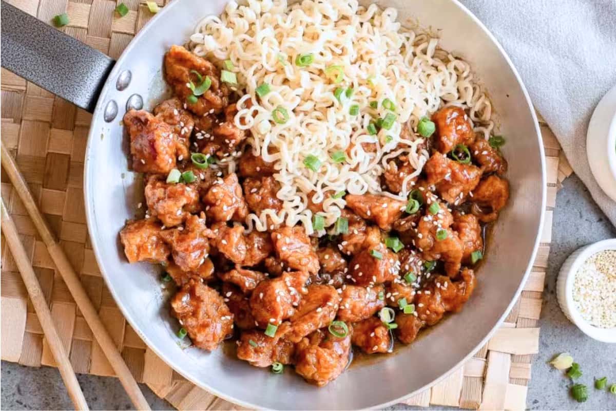 A dish of General Tso Chicken and Ramen.