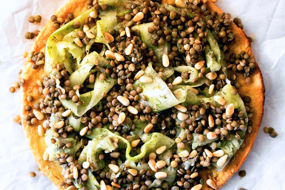A dish of Socca with Cucumber Lentil Salad.