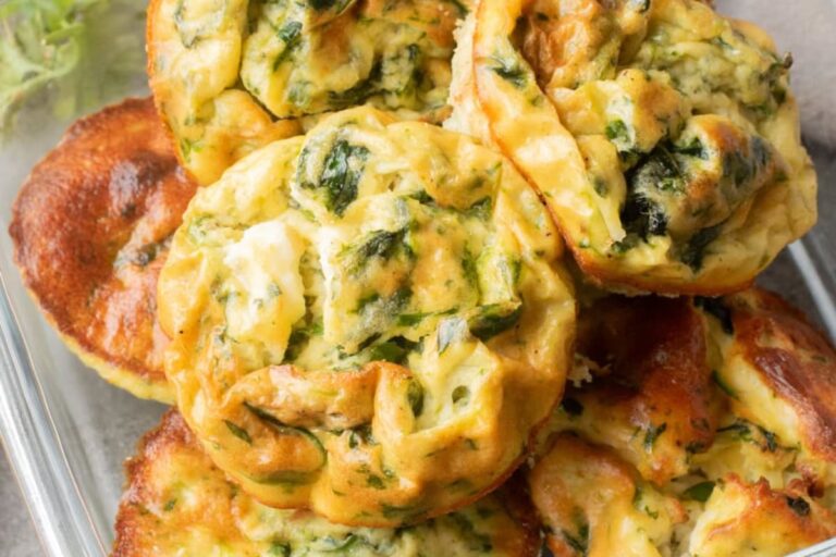 A dish of Cottage Cheese Egg Bites with Spinach and Feta.