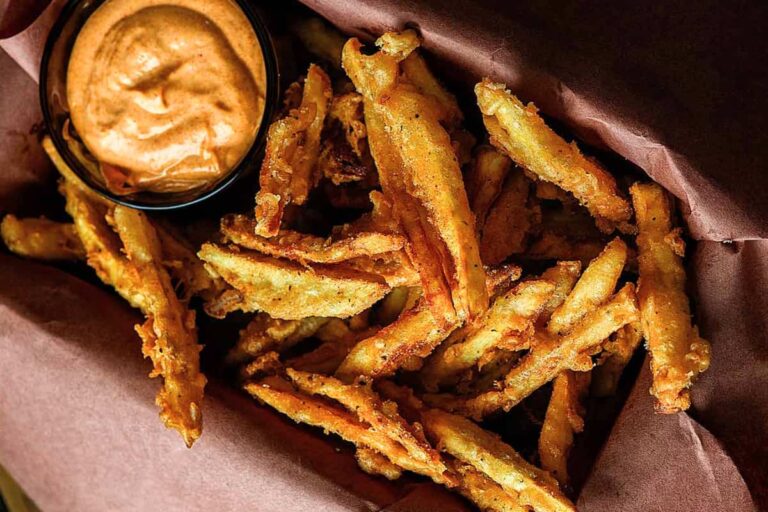 A dish of Popeyes Cajun Fries.