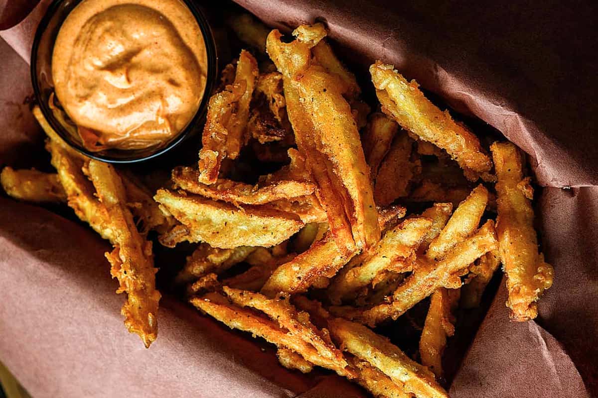 A dish of Popeyes Cajun Fries.
