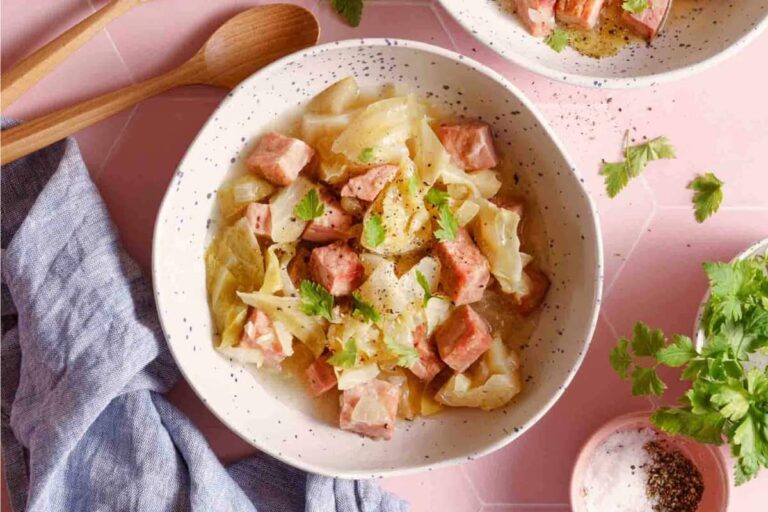 A bowl of Crock Pot Cabbage and Ham.