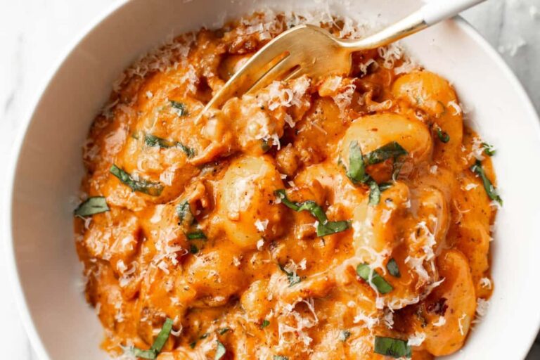A dish of Spicy Tomato Gnocchi with Bacon.