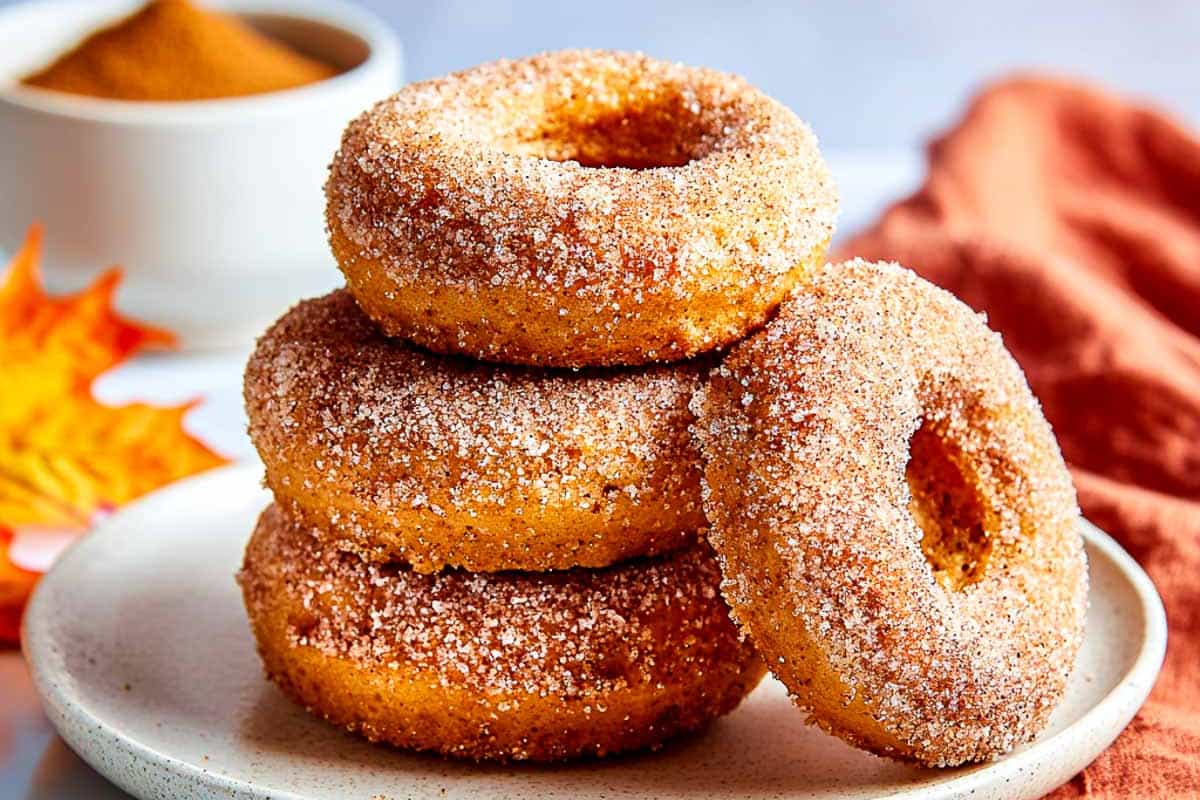 A plate of Pumpkin Cottage Cheese Donuts.