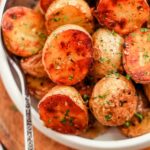 A dish of roasted baby potatoes.