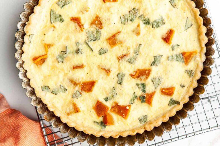 A dish of Roasted Pumpkin Quiche with Feta.