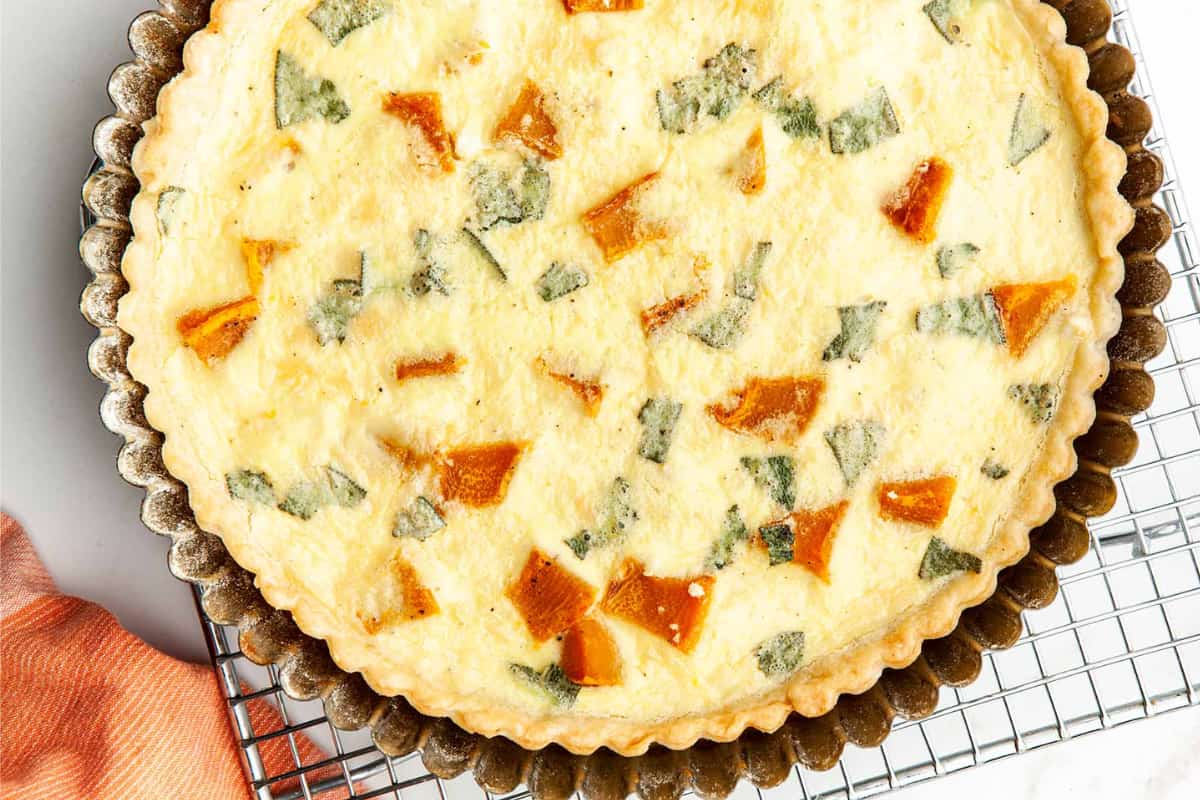 A dish of Roasted Pumpkin Quiche with Feta.