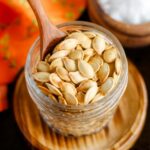 A dish of roasted pumpkin seeds.