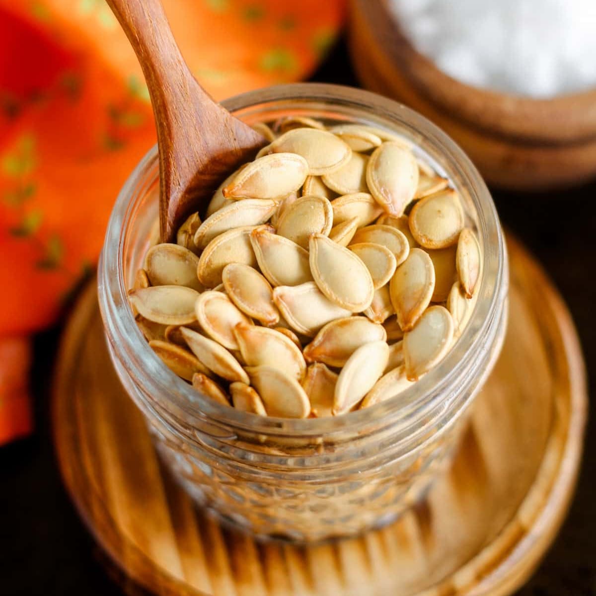 A dish of roasted pumpkin seeds.