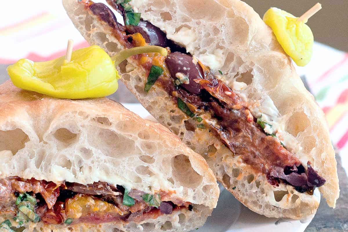A Roasted Tomato Sandwich on a plate.