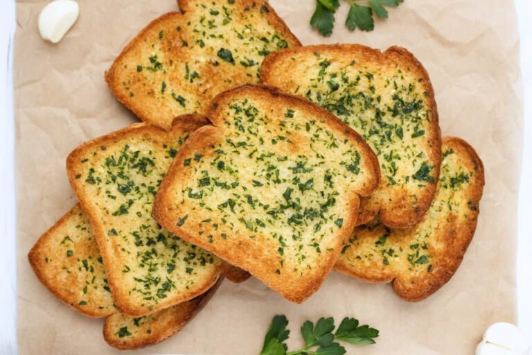 A dish of Garlic Bread with Sliced Bread.