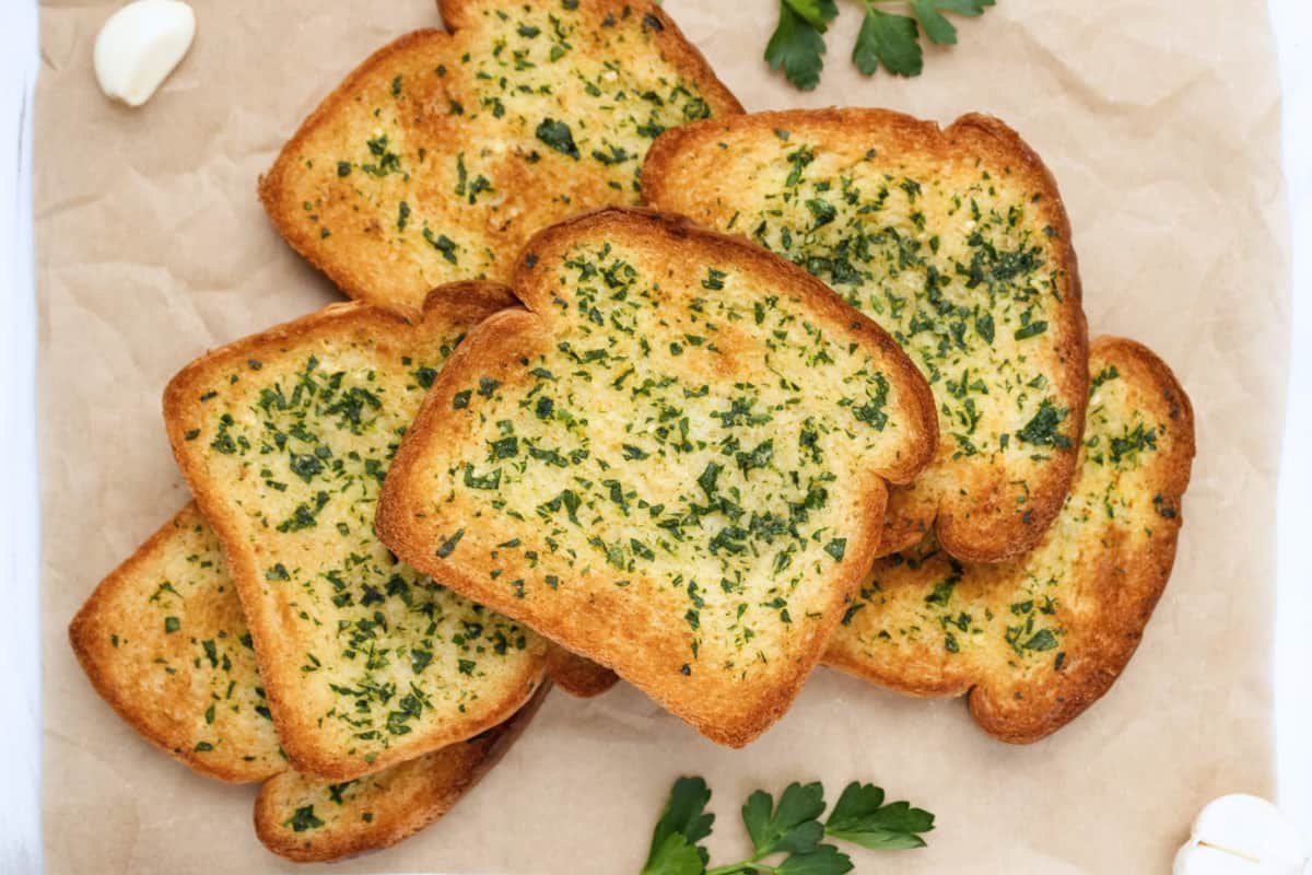 A dish of Garlic Bread with Sliced Bread.
