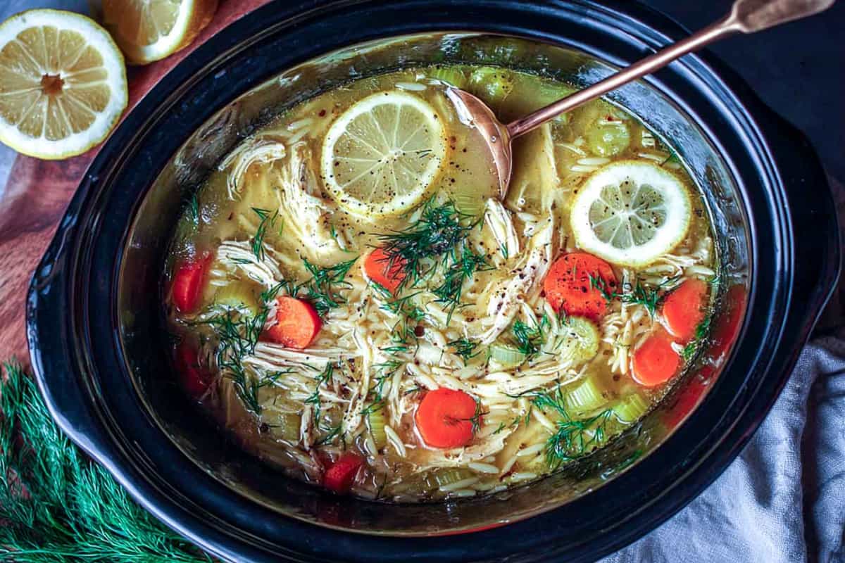 A dish of Crockpot Chicken Orzo Soup.