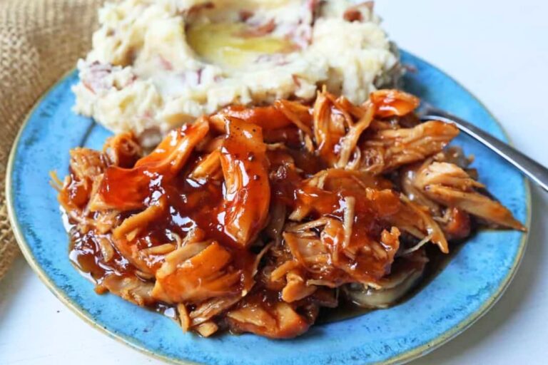 A plate of Slow Cooker Chicken with Peach Barbecue Glaze.