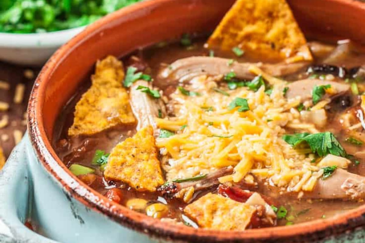 A dish of 30-Minute Nacho Chicken Soup.