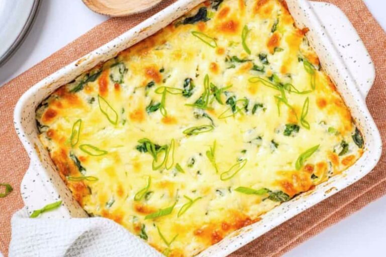 A dish of Cheesy Rice Casserole with Leftover Rice.