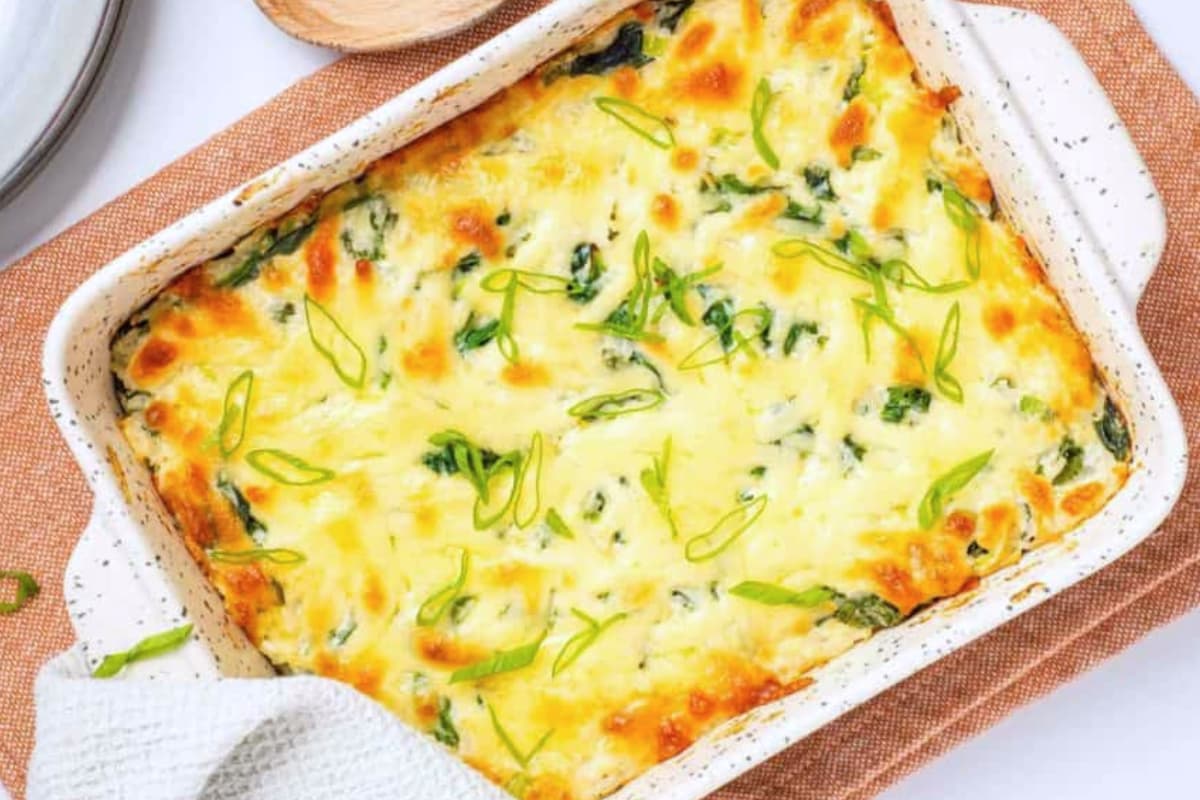 A dish of Cheesy Rice Casserole with Leftover Rice.