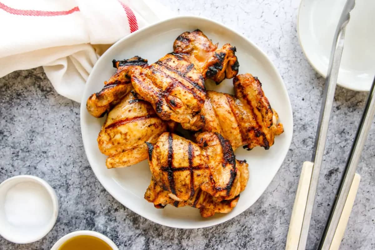 A dish of Grilled Honey Lemon Chicken Thighs.