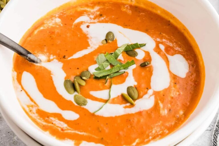 A dish of Crockpot Creamy Pumpkin Soup.